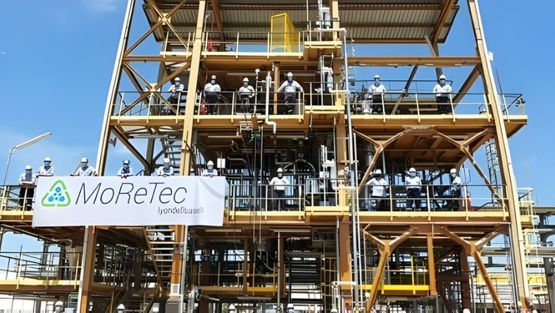 MoReTec industrial plant structure with workers on elevated steel platforms